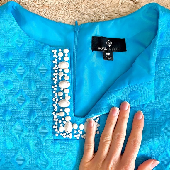 Ronni Nicole Blue Patterned Dress w/ White Shell Accents - Picture 2 of 3